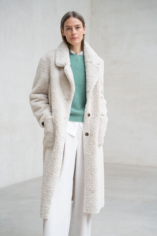 ABRIGO LARGO REVERSIBLE CON SOLAPAS CRUDO