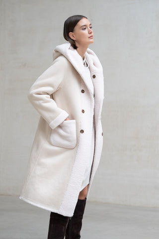 ABRIGO LARGO CAPUCHA REVERSIBLE CRUDO